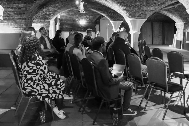 Audience seated on chairs