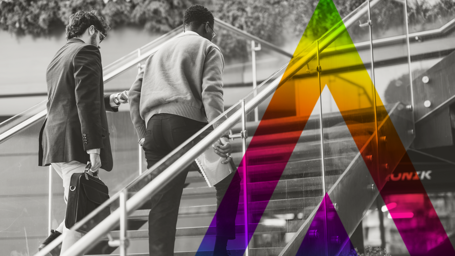 Two people climbing stairs together with rainbow arrow graphic